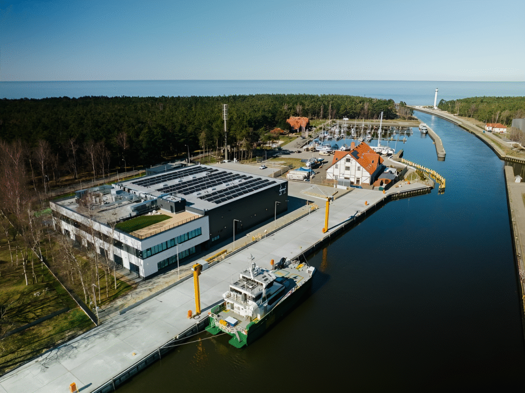 Poland Opens Baltic's Largest Offshore Wind Terminal Led By ORLEN Neptun 4 Aerial view of ORLEN Neptun’s offshore wind terminal in Świnoujście, Poland, the biggest installation hub in the Baltic Sea.
